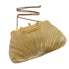 Load image into Gallery viewer, Vintage gold lame fabric Art Deco evening bag. Hong Kong. Its pleated design, chain strap, and gold toned clasp and handle with rhinestone detail create a shimmering display. Its yellow satin lining and interior pocket ensure your belongings stay safe and organized. In good vintage condition, minor tear on the interior lining with wear commensurate with age. Bag measures 9 3/4 x 6 1/4 inches (at widest point, not including handle) Chain measures 40 inches
