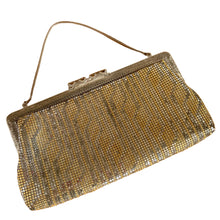 Load image into Gallery viewer, Stunning vintage silver and gold mesh evening bag with a geometric pattern, ornate patterned silver toned clasp, rope chain strap and pale gray lining with open pocket. Crafted by Elga, USA.

In good vintage condition, inside and out with wear to the mesh.

Measures 10 x 5 1/4 inches and with the strap 9 3/4 inches.
