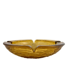 Load image into Gallery viewer, Vintage gold Soreno amber glass ashtray features a bark-like texture. Crafted by Anchor Hocking, USA, 1966 - 1970. A great piece for the tobacciana collector!

In excellent condition, no chips.

Measuring 8 3/4 x 2 inch
