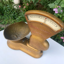 Load image into Gallery viewer, Antique gold toned 3lb cast iron weigh scale, model 405AR with brass bowl. This type of scale was typically used to weigh candy in a general store. Crafted by the Canadian Toledo Scale Co. Canada, early 20th century. Note the product plate showing the date it was patented as July 22, 1919 with patents pending.
