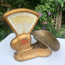 Load image into Gallery viewer, Antique gold toned 3lb cast iron weigh scale, model 405AR with brass bowl. This type of scale was typically used to weigh candy in a general store. Crafted by the Canadian Toledo Scale Co. Canada, early 20th century. Note the product plate showing the date it was patented as July 22, 1919 with patents pending.
