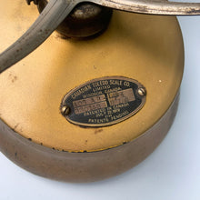 Load image into Gallery viewer, Antique gold toned 3lb cast iron weigh scale, model 405AR with brass bowl. This type of scale was typically used to weigh candy in a general store. Crafted by the Canadian Toledo Scale Co. Canada, early 20th century. Note the product plate showing the date it was patented as July 22, 1919 with patents pending.
