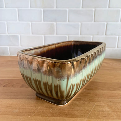 Stunning rectangular ceramic pottery planter with a striking vertical leaf motif finished with a coppery gold and turquoise and brown drip glaze with deep brown interior. Crafted by Lefton, Japan, circa 1950s.  In excellent condition, free from chips/cracks/repairs. Marked 