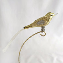 Load image into Gallery viewer, Stunning vintage gold and silver glitter glass bird clip-on Christmas tree ornament. Perfect for the tree or dress up your holiday decor.

In excellent condition.

Measures 7 1/2 inches
