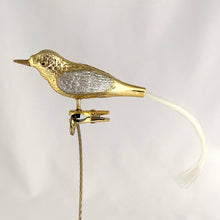 Load image into Gallery viewer, Stunning vintage gold and silver glitter glass bird clip-on Christmas tree ornament. Perfect for the tree or dress up your holiday decor.

In excellent condition.

Measures 7 1/2 inches
