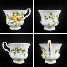 Load image into Gallery viewer, This vintage bone china footed teacup and saucer is so sweet! Both the cup and saucer are decorate with the &quot;Goldfinch&quot; pattern from the Woodland Series. Each piece has a lovely scalloped edge featuring a hand painted goldfinch bird with spruce boughs, trimmed with gold gilt. Produced by Royal Albert, England, circa 1917 - 1927.  In excellent condition, free from chips, cracks and repairs. Maker&#39;s marks are on the bottom.   Teacup measures 3 3/8 x 2 3/4 inches  | Saucer measures 5 1/4 inches
