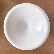 Load image into Gallery viewer, The words &quot;stunning&quot; and &quot;elegant&quot; embody this incredible milk glass pitcher in the &quot;Harvest&quot; pattern of grapes and vines. This is the largest version in this series holding 72oz. Made by Colony (Indiana) Glass Co. Circa 1966. This pitcher would look amazing on any tablescape or use it for a beautiful floral bouquet.  In excellent condition, no chips or cracks.  Measures 6 x 10 3/8 inches
