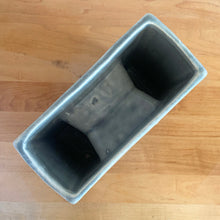 Load image into Gallery viewer, Vintage mid-century gray Arcature Line vase with central deep red bird. Crafted by McCoy Pottery, USA, early 1950s. This rare piece is must for any art pottery collector!

In excellent condition, no chips/cracks/repairs. Maker&#39;s mark.

Measures 6 1/4 x 2 7/8 x 6 1/2 inches
