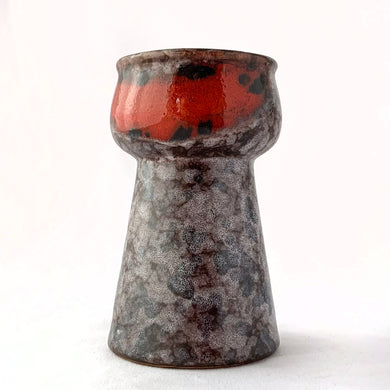 Vintage mid-century modern Fat Lava glaze vase in mottled gray and blue with red streaks  vase, shape 1248. Produced by Strehla Keramik, Germany, circa 1960s. The shape of this vase lends itself well for forcing flower bulbs or a beautiful bouquet.  In excellent condition, free from chips/cracks/repairs. Maker's mark on the bottom with the number 1248 denoting the shape.  Measures 2 5/8 x 4 1/2 inches.
