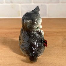 Load image into Gallery viewer, Delightful vintage gray and white cat with ladybug porcelain figurine. Crafted by Goebel, West Germany. Add this sweet figurine to your collection!

In excellent condition, no chips/cracks.

Measures 2 1/2 x 1 3/8 x 2 1/4 inches
