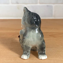 Load image into Gallery viewer, Delightful vintage gray and white cat with ladybug porcelain figurine. Crafted by Goebel, West Germany. Add this sweet figurine to your collection!

In excellent condition, no chips/cracks.

Measures 2 1/2 x 1 3/8 x 2 1/4 inches
