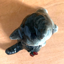Load image into Gallery viewer, Delightful vintage gray and white cat with ladybug porcelain figurine. Crafted by Goebel, West Germany. Add this sweet figurine to your collection!

In excellent condition, no chips/cracks.

Measures 2 1/2 x 1 3/8 x 2 1/4 inches
