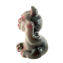 Load image into Gallery viewer, This hand painted ceramic gray and pink kitty cat salt shaker is single and ready to mingle! She is a little salty and is looking for a peppery mate. Available for all meals. No cork. Made in Japan.

In excellent condition, no chips or cracks.

Measures 2 1/8 x 2 x 2 3/4 inches
