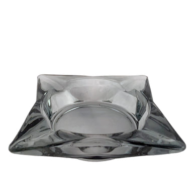 Vintage mid-century era clear smoke gray pressed glass pinched square ashtray. Perfect for the tobacciana collector!  In excellent condition, free from chips.  Measures 3 1/8 x 3 1/8 x 7/8 inches