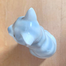 Load image into Gallery viewer, Delightful vintage gray tabby cat porcelain figurine. Crafted by Otagiri, Japan. Add this sweet figurine to your collection!

In excellent condition, no chips/cracks.

Measures 2 1/4 x 1 5/8 x 3 1/2 inches
