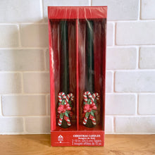 Load image into Gallery viewer, Sweet pair of green Christmas taper candles with figural red/white/green candy canes and bows. A great way to add a warm glow to your holiday decor!  Measures 10 inches. New in box.
