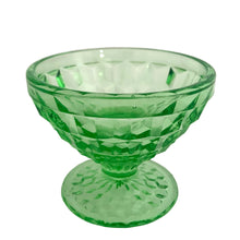 Load image into Gallery viewer, Vintage depression era Cube green uranium glass sherbet dish. Crafted by Jeannette Glass, USA, 1929 - 1933. Glows beautifully under black light. This versatile dish makes the perfect dessert bowl, or use it as a catchall on a vanity for trinkets.

In excellent condition, no chips. Typical manufacturing bubbles.

Measures 3 1/2 x 2 1/2 inches
