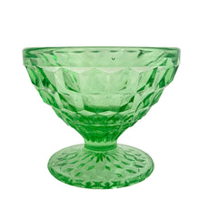 Load image into Gallery viewer, Vintage depression era Cube green uranium glass sherbet dish. Crafted by Jeannette Glass, USA, 1929 - 1933. Glows beautifully under black light. This versatile dish makes the perfect dessert bowl, or use it as a catchall on a vanity for trinkets.

In excellent condition, no chips. Typical manufacturing bubbles.

Measures 3 1/2 x 2 1/2 inches
