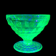 Load image into Gallery viewer, Vintage depression era Cube green uranium glass sherbet dish. Crafted by Jeannette Glass, USA, 1929 - 1933. Glows beautifully under black light. This versatile dish makes the perfect dessert bowl, or use it as a catchall on a vanity for trinkets.

In excellent condition, no chips. Typical manufacturing bubbles.

Measures 3 1/2 x 2 1/2 inches

