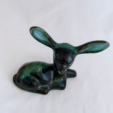 Load image into Gallery viewer, A really sweet green drip glaze seated deer figurine. Crafted by the king of redware, Blue Mountain Pottery, Canada, circa 1960/70s. A lovely piece to begin or add to your art pottery collection....just look at those irresistible ears! Made in Canada in the 1960s (see below for a brief history).  In excellent condition, free from chips/cracks/repairs.  4 1/2 x 2 x 3 7/8 inches

