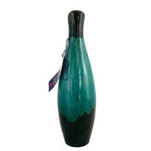 Load image into Gallery viewer, Vintage turquoise drip glaze redware pottery handled jug or ewer. Crafted by Blue Mountain Pottery, Canada, 1970s. A must-have for any BMP collector!

In like new, excellent condition, no chips, cracks or repairs. Original sticker and tag.

Measures 3 x 10 5/8 inches
