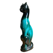 Load image into Gallery viewer, Large vintage retro green drip glaze cat redware pottery figurine or TV lamp, featuring open eyes and hole at the tale for a lighting cord or incense. Crafted by Canadian Ceramic Craft (CCC), Canada, circa 1960s. Add this very cool cat to your collection. For an extra spooky look for your Halloween decor, put a tiny light inside to make the eyes glow!

In excellent condition, no chips/cracks/repairs.

Measures 5 5/8 x 3 3/8 x 17 1/2 inches
