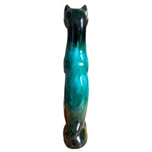 Load image into Gallery viewer, Large vintage retro green drip glaze cat redware pottery figurine or TV lamp, featuring open eyes and hole at the tale for a lighting cord or incense. Crafted by Canadian Ceramic Craft (CCC), Canada, circa 1960s. Add this very cool cat to your collection. For an extra spooky look for your Halloween decor, put a tiny light inside to make the eyes glow!

In excellent condition, no chips/cracks/repairs.

Measures 5 5/8 x 3 3/8 x 17 1/2 inches
