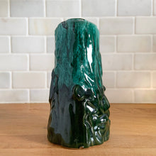Load image into Gallery viewer, Vintage green drip glaze pitcher, featuring a woodland design of raised mushrooms and knots around a tree trunk. Crafted by Evangeline Pottery, Canada, 1960s. This sweet pitcher makes for a beautiful statement piece or a functional pitcher for your home.

In excellent condition, no chips/cracks/repairs.

Measures 5 x 3 5/8 x 6 1/4 inches
