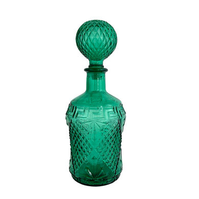 Vintage green glass decanter and stopper featuring a diamond and Greek key pattern. Marked 