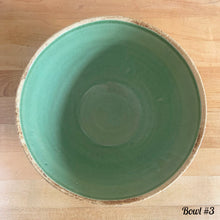 Load image into Gallery viewer, Antique green glazed stoneware 2 quart mixing bowl featuring a basketweave and fan pattern. Crafted by Robinson Ransbottom, USA, 1920s. A well-crafted piece of vintage stoneware offering a nostalgic vibe to your farmhouse or cottage kitchenware and decor!

Bowl #1 is in as found vintage condition, no chips/cracks/repairs, age-related crazing and glaze pops. Crown 8 mark.

Measure 8 1/4 x 4 3/8 inches
