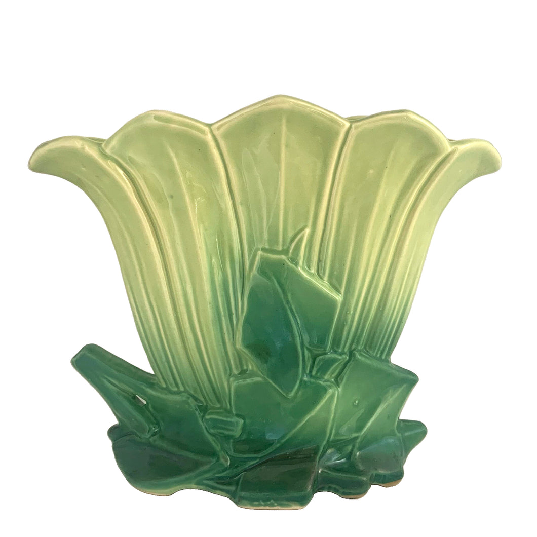Exceptional vintage gloss two-tone green art deco tulip fan flower vase with decorative base. Crafted by McCoy Pottery, 1954. This rare vase must for any art pottery collector!

In excellent vintage condition, no chips/crack/repairs, no noticeable crazing. Maker's mark on the bottom.

Measures 10 1/4 x 4 1/8 x 8 3/8 inches