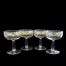 Load image into Gallery viewer, Set of four vintage mid-century era avocado green and gold Atomic Dots champagne coupe cocktail glasses! Crafted by Federal Glass, USA, 1950s. Use these effervescent beauties to serve your favourite champers, martinis or use them as sherbets. Your bar cart will be the star of the show with their effervescent rising bubbles.....cheers!

In excellent condition, no chips.

Measures 3 1/2 x 4 1/4 inches

Capacity 6 ounces
