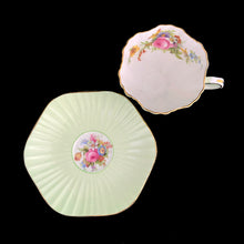 Load image into Gallery viewer, Overhead view of EB Foley 1850 bone china teacup and saucer showing mint green rose bouquet and gold gilt rim, Pattern 3627
