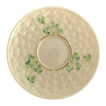Load image into Gallery viewer, Vintage bone china demitasse flat cup and saucer, featuring delicate green shamrocks on cream ground impressed with a basketweave design. Crafted by Belleek, Ireland, 1965 - 1980. Makes a beautiful gift or addition to your collection!
