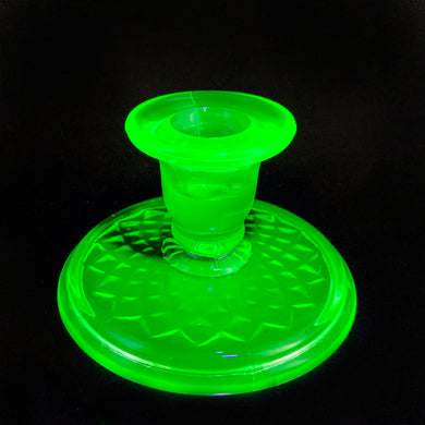 Vintage art deco style green uranium glass single lite candle holder with quilted diamond patterned base. Crafted by the Imperial Glass Company, USA, circa 1920s. A beautiful and practical piece that's perfect to start or add to your collection!  In excellent condition, free from chips. Small area of rough from mold release.  Measures 4 1/2 x 2 1/2 inches    