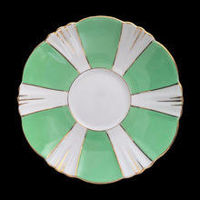 Load image into Gallery viewer, This antique art deco style white bone china teacup and saucer is simply elegant! Both the cup and saucer have a lovely square scalloped edge, hand painted in green colour blocks alternating with white along with gold gilt details and rim. Crafted by Royal Albert Crown China, England, between 1925 to 1927. A beautiful old piece that has stood the test of time!
