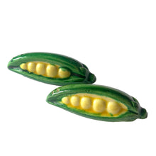 Load image into Gallery viewer, Adorable kitschy pair of vintage corn cob ceramic salt and pepper shakers in vibrant green and yellow. Crafted in Japan. In excellent vintage condition. one shaker has the corn and the other with the cork fallen inside the shaker. Measures 2 3/4 x 7/8 inches
