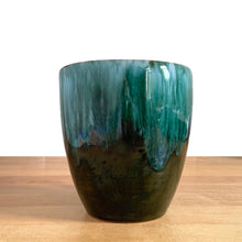 Load image into Gallery viewer, This fabulous vintage green and black drip glazed mug was produced by Blue Mountain Pottery, the pride of Collingwood, Canada, circa 1970. Perfect for your morning cuppa!

Excellent condition, no chips or cracks.

Measures 4 x 4 inches (without handle)
