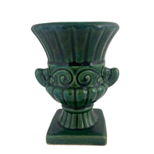 Load image into Gallery viewer, Vintage mid-century green pedestal urn shaped vase with handles and ribbed pattern. Crafted by Beauce, Canada, 1960s. This lovely vase is must for any art pottery collector!

In excellent condition, no chips/cracks/repairs, crazing commensurate with age, typical manufacturing glaze pops. Maker&#39;s mark on the bottom.

Measures 4 x 5 1/2 inches
