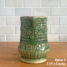 Load image into Gallery viewer, Antique vintage art deco gloss green Rosella 320 ceramic yellow ware pitcher featuring climbing roses on a basketweave pattern. Crafted by Robinson Clay Product Company, the precursor to Robinson Ransbottom Pottery, USA, early 1900s. A beautiful piece to add to your art pottery collection! Option 1, 5 1/4 x 5 inches
In as found vintage condition, no chips/repairs, tiny crack at the spout, age-related crazing. Typical manufacturing glaze pops. Unmarked.
