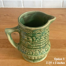 Load image into Gallery viewer, Antique vintage art deco gloss green Rosella 320 ceramic yellow ware pitcher featuring climbing roses on a basketweave pattern. Crafted by Robinson Clay Product Company, the precursor to Robinson Ransbottom Pottery, USA, early 1900s. A beautiful piece to add to your art pottery collection! Option 1, 5 1/4 x 5 inches
In as found vintage condition, no chips/repairs, tiny crack at the spout, age-related crazing. Typical manufacturing glaze pops. Unmarked.
