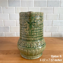 Load image into Gallery viewer, Antique vintage art deco gloss green Rosella 320 ceramic yellow ware pitcher featuring climbing roses on a basketweave pattern. Crafted by Robinson Clay Product Company, the precursor to Robinson Ransbottom Pottery, USA, early 1900s. A beautiful piece to add to your art pottery collection! Option 4, 6 1/2 x 7 1/2 inches
In excellent vintage condition, no chips/cracks/repairs, age-related crazing. Typical manufacturing glaze pops. Unmarked.
