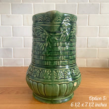 Load image into Gallery viewer, Antique vintage art deco gloss green Rosella 320 ceramic yellow ware pitcher featuring climbing roses on a basketweave pattern. Crafted by Robinson Clay Product Company, the precursor to Robinson Ransbottom Pottery, USA, early 1900s. A beautiful piece to add to your art pottery collection! Option 5, 6 1/2 x 7 1/2 inches
In as found vintage condition, no cracks/repairs, chips to handle, age-related crazing and large manufacturing glaze pops. Maker&#39;s marks.
