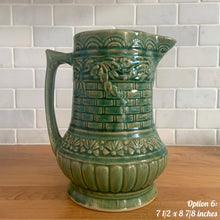 Load image into Gallery viewer, Antique vintage art deco gloss green Rosella 320 ceramic yellow ware pitcher featuring climbing roses on a basketweave pattern. Crafted by Robinson Clay Product Company, the precursor to Robinson Ransbottom Pottery, USA, early 1900s. A beautiful piece to add to your art pottery collection! Option 6, 7 1/2 x 8 7/8 inches. In excellent vintage condition, no chips/cracks/repairs, age-related crazing. Typical manufacturing glaze pops. Unmarked.
