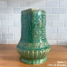 Load image into Gallery viewer, Antique vintage art deco gloss green Rosella 320 ceramic yellow ware pitcher featuring climbing roses on a basketweave pattern. Crafted by Robinson Clay Product Company, the precursor to Robinson Ransbottom Pottery, USA, early 1900s. A beautiful piece to add to your art pottery collection! Option 7, 7 1/2 x 8 7/8 inches. In excellent vintage condition, no chips/cracks/repairs, age-related crazing. Typical manufacturing glaze pops. Unmarked.
