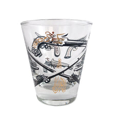 Load image into Gallery viewer, Set of six vintage wild west themed double shot glasses featuring revolvers and pistols in black, white and gold. Crafted by Libbey Glass, circa 1950s. A great addition to your barware collection!
In excellent condition, no chips. Marked on the bottom with the Libbey L.

Measures 2 3/4 x 3 inches

Capacity 2 ounces
