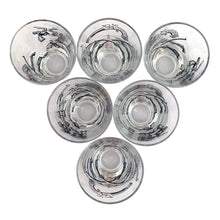 Load image into Gallery viewer, Set of six vintage wild west themed double shot glasses featuring revolvers and pistols in black, white and gold. Crafted by Libbey Glass, circa 1950s. A great addition to your barware collection!
In excellent condition, no chips. Marked on the bottom with the Libbey L.

Measures 2 3/4 x 3 inches

Capacity 2 ounces
