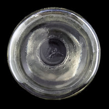 Load image into Gallery viewer, Bottom view of Vintage Harris &amp; Sons Dairy Lakeside 2392 8 oz Clear Glass Cream Bottle showing maker's mark of Dominion Glass, Canada, 1950s.
