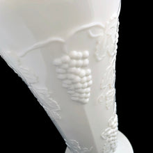 Load image into Gallery viewer, Vintage milk glass Harvest trumpet shaped, footed vase features a pressed grape and leaf pattern. Crafted by Colony Glass, circa 1960s. A wonderful addition to farmhouse, cottage and wedding decor.

In excellent condition, no chips or cracks.

Measures 4 7/8 x 9 7/8 inches
