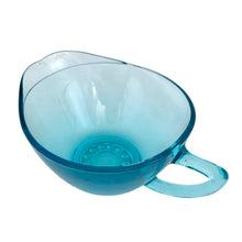 Load image into Gallery viewer, Elevated angled view of Hazel-Atlas Capri Hobnail creamer showing interior, electric turquoise pressed glass with hobnail pattern on base, loop handle visible, USA 1950s
